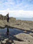 SX22721 Pepijn reflected in puddle on Worms Head.jpg